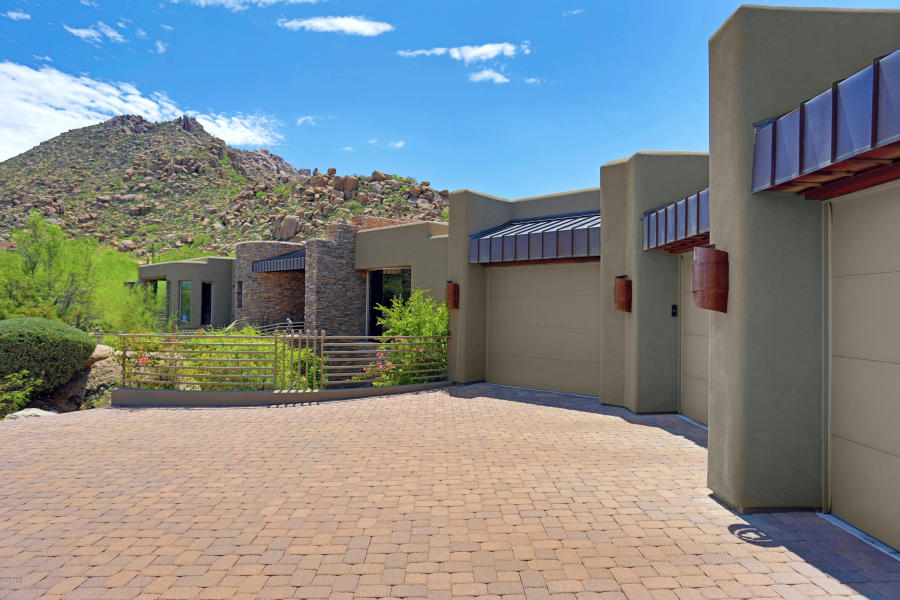 Soft Southwest Contemporary blends perfectly with the Arizona Desert boulders and its&nbsp;spectacular!
