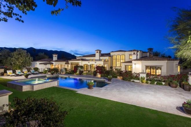 Blending Mediterranean and Country French architecture in Paradise Valley 1