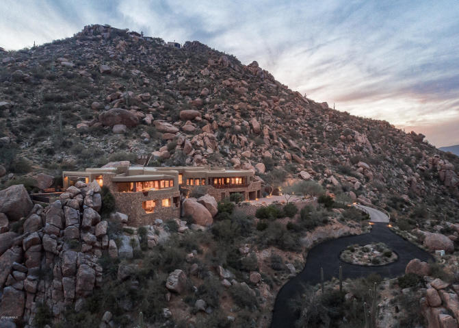 Insane Views! Picture perfect Carefree Southwest contemporary surrounded by&nbsp;boulders.